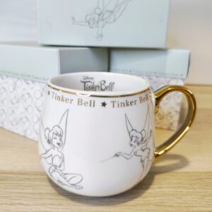 Taza Disney Campanilla – Diseño Lineal con Detalles Dorados + Caja Decorativa
